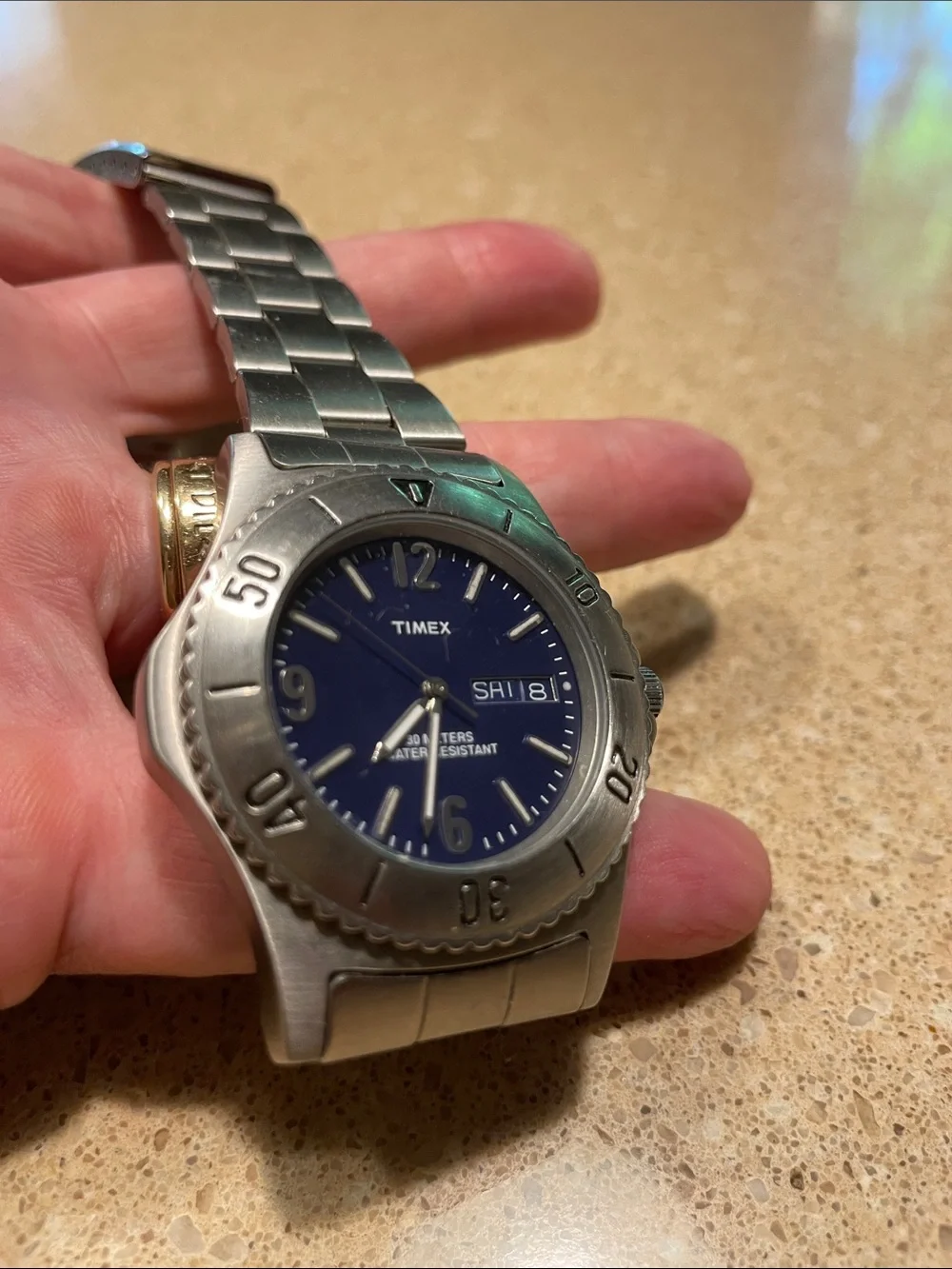 Timex Silver-Tone Watch with Blue Dial and Rotating Bezel